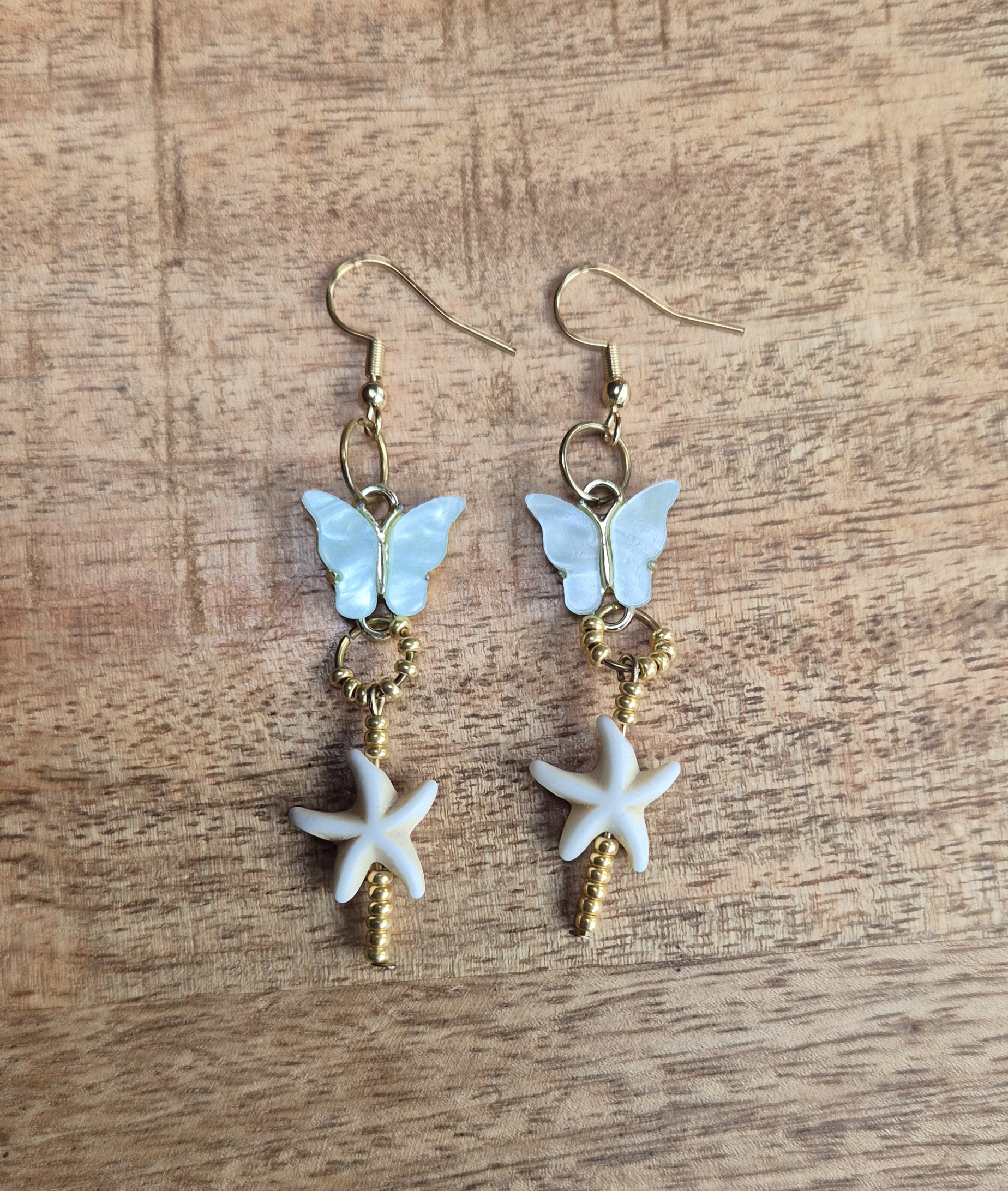 Mintgroene vlinder oorbellen