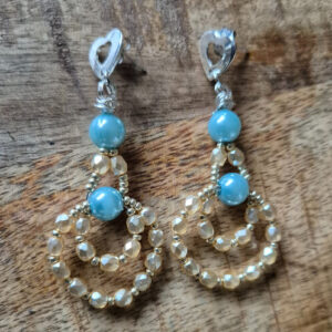 Statement oorbellen beige