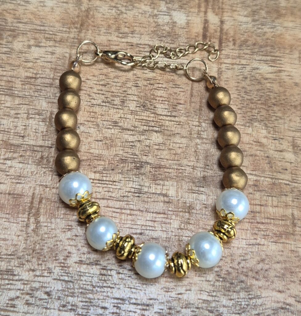 Parel armband goud/crème