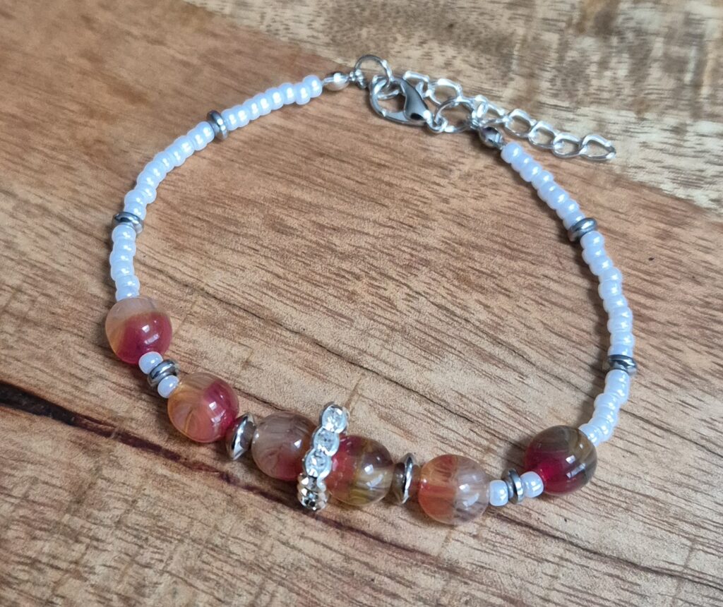 Wit/oranje armband