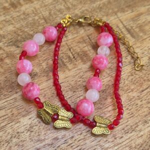 Vlinder armband rood/roze
