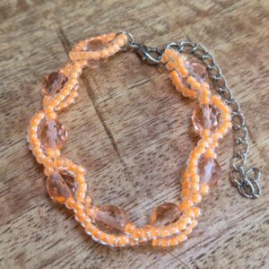 Neon oranje armbandje