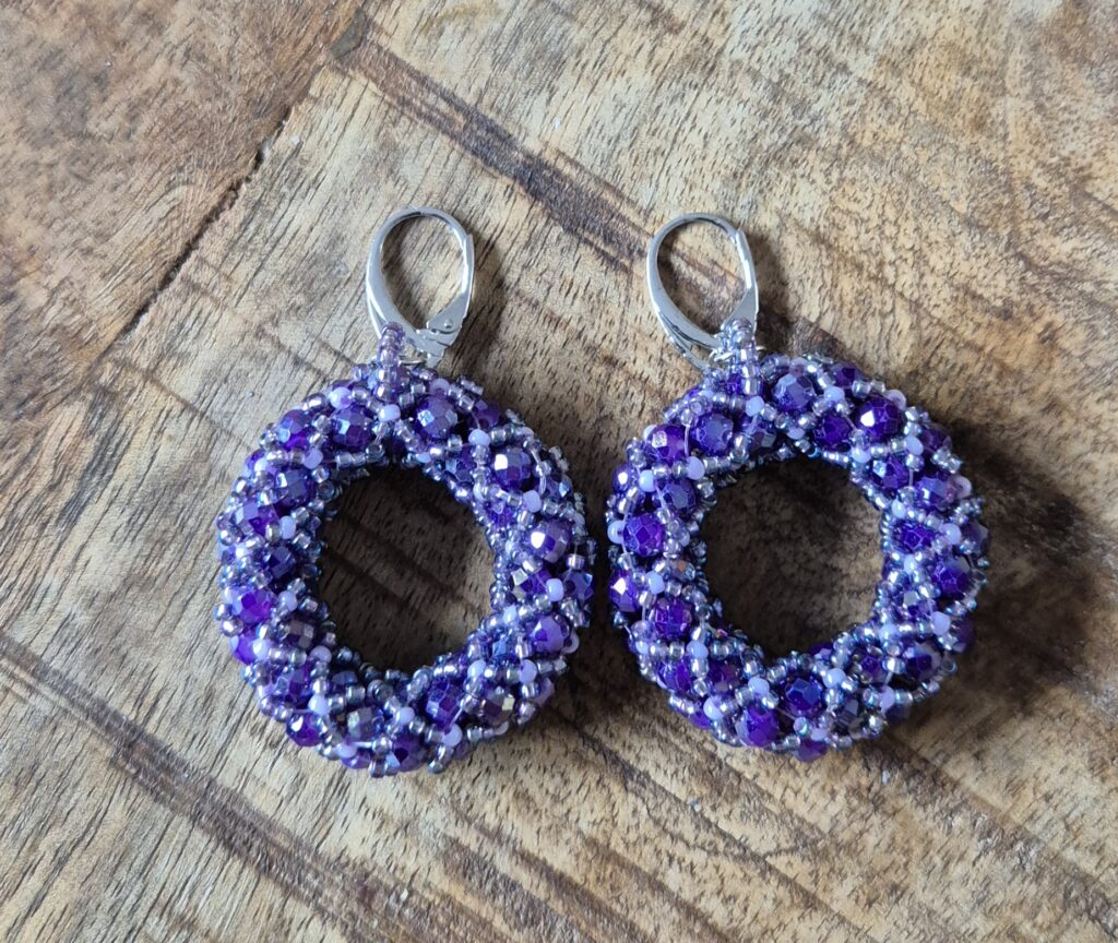 Statement oorbellen paars